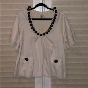 Anthropologie flared top with wood detail